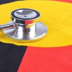Image of stethoscope on Indigenous flag